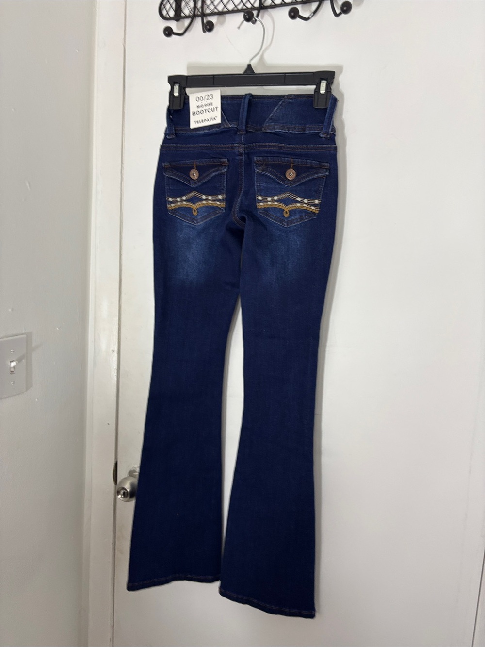 Women’s High-Rise Dark Blue Flare Jeans with Triple-Button Waist